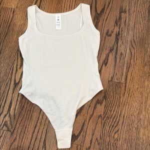 Lululemon Athletica Cream Bodysuit